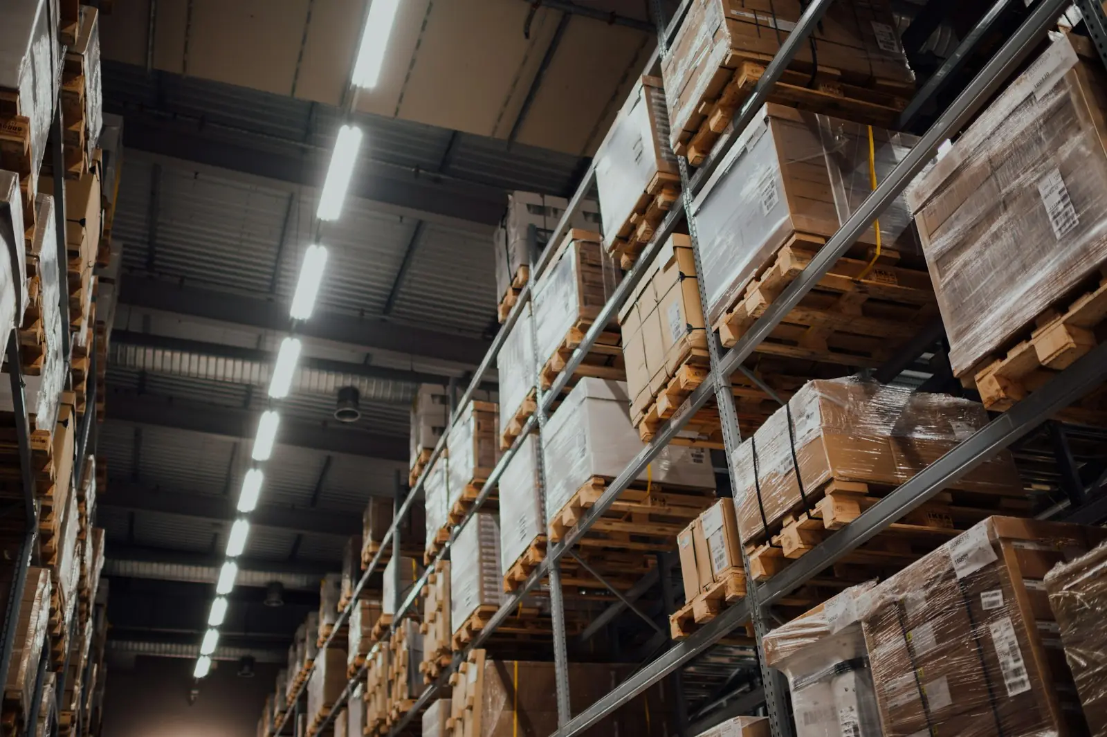 Wrapped cartons stored on pallet racking